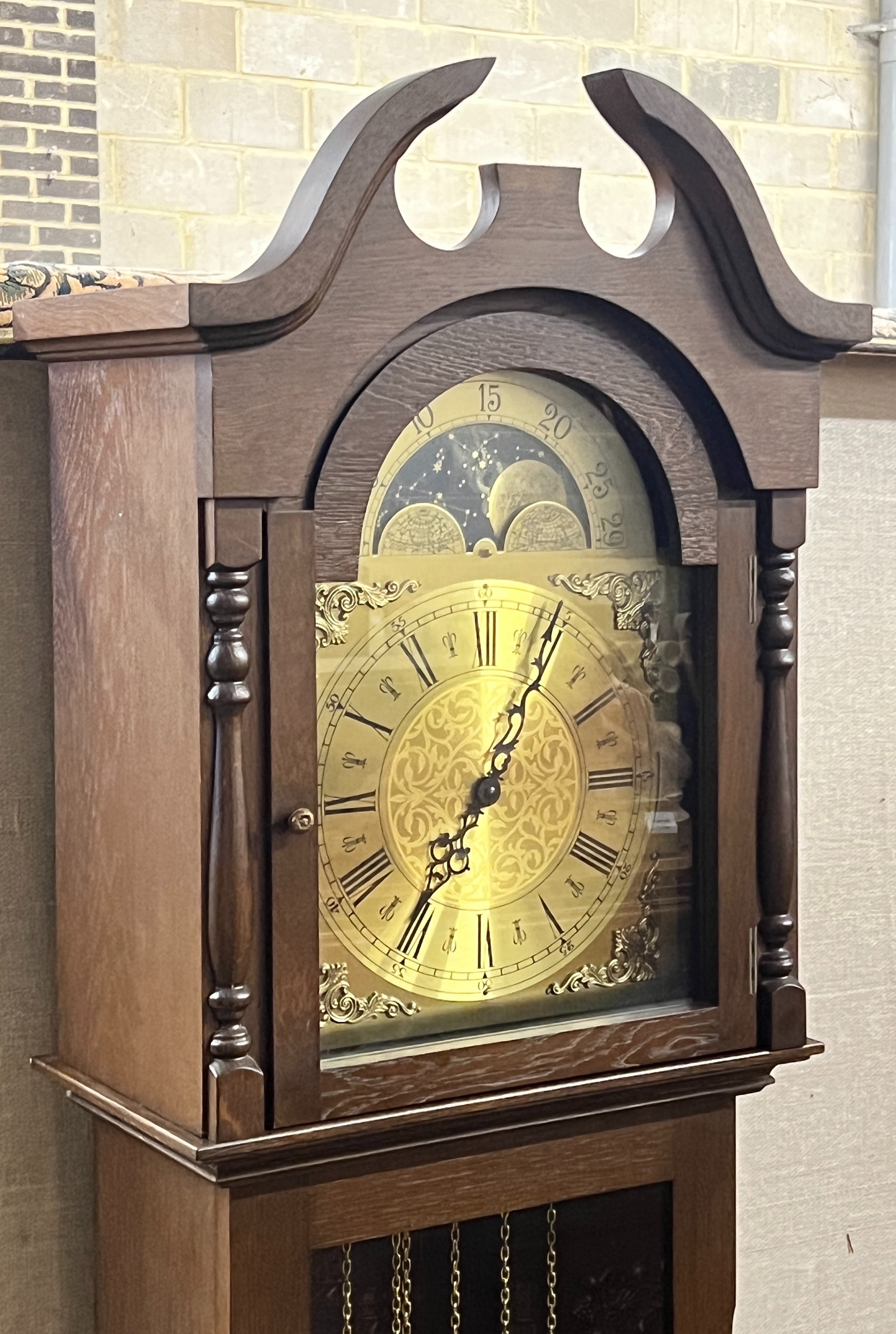 A reproduction German 8 day striking longcase clock with moon phase, height 190cm